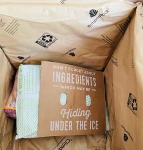 HelloFresh refrigerated items under a recyclable cold pack in an insulated box